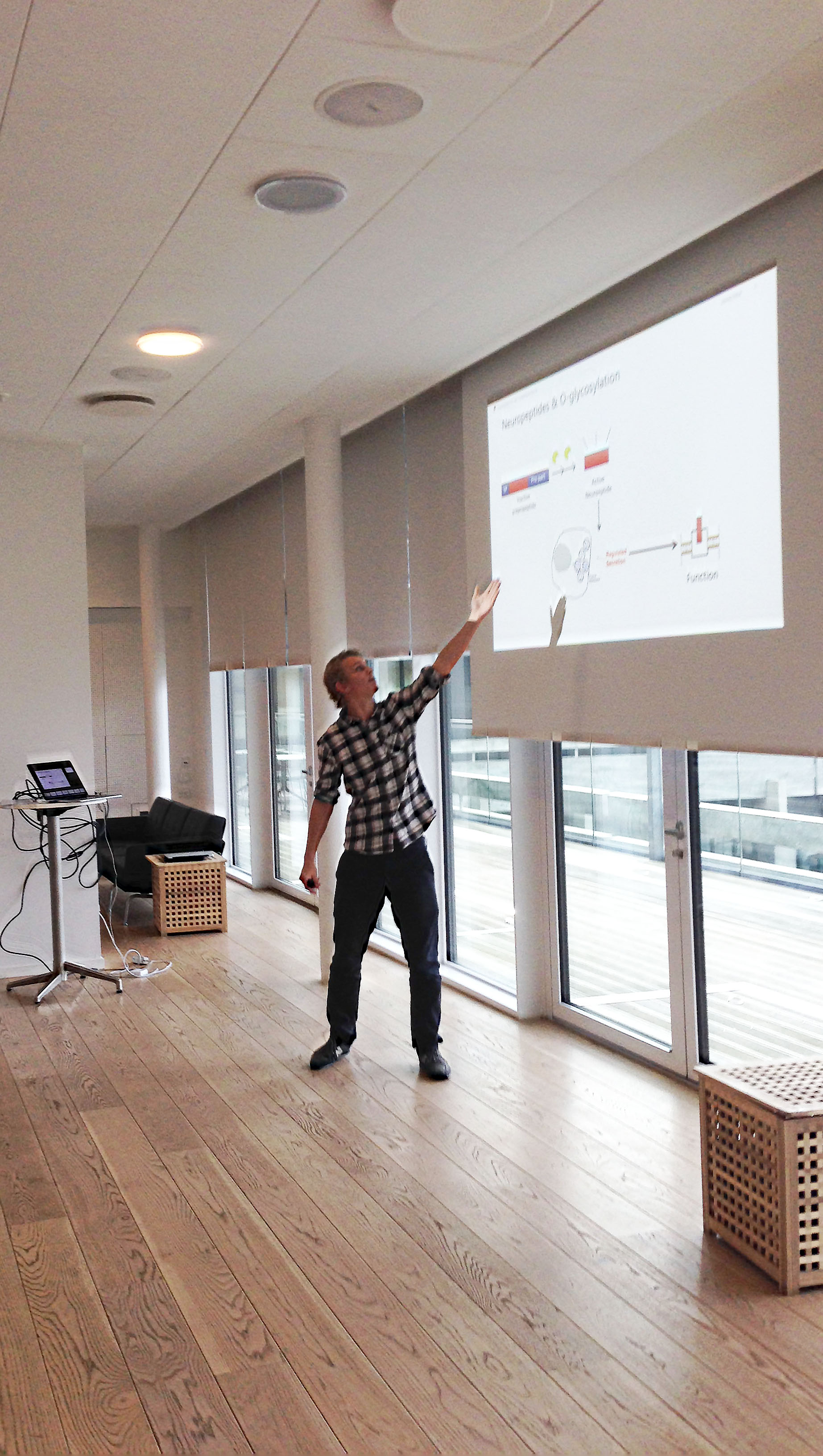 photo of CCG's master student Thomas Daugbjerg Madsen presenting at a meeting