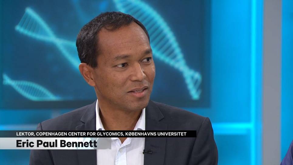 screenshot of Associate professor Eric Bennett from CCG giving an interview on DR2 TV